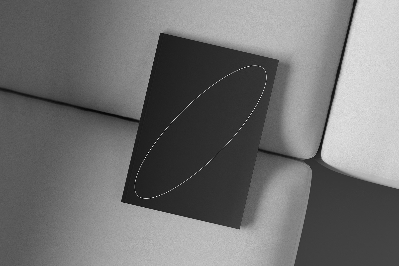 Modern book cover mockup featuring a minimalist black and white design, suitable for print mockups and graphic design projects, ideal for designers.