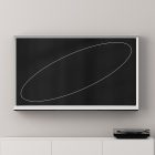 Blank digital screen mockup in a minimalistic home interior, suitable for tech mockups for graphic designers, with a modern media console.