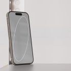 Elegant smartphone tech mockup against a minimalist backdrop perfect for showcasing mobile app designs and graphic elements for digital asset stores.
