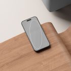 Smartphone mockup on a wooden chair suitable for tech mockups, digital assets for designers, graphic design resources, product presentation template.