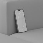Smartphone tech mockup isolated on a grey sofa showcasing a modern phone screen for graphic designers to use in digital asset stores. Perfect for design presentation.