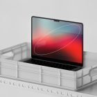 Laptop in a plastic crate on a metal shelf showcasing a vibrant screen. Tech mockup for graphic designers. Perfect for website or UI design presentation.