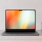 Modern laptop with vibrant screen on an industrial shelf suitable for tech mockups digital assets for graphic designers optimized for SEO.