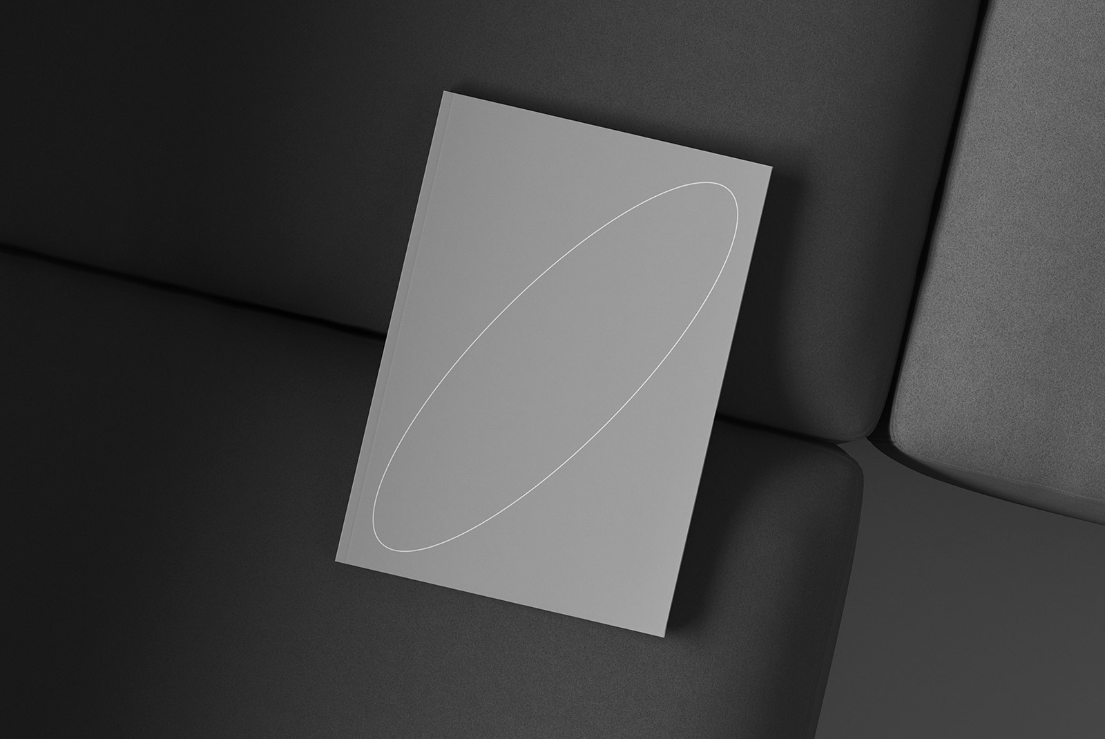 Gray softcover book mockup on black background ideal for print mockups graphic designers clean design professional layout high-quality realistic presentation