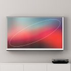 Flat screen TV tech mockup with abstract colorful display mounted on wall, minimalistic living room decor; creative asset for graphic designers and tech projects