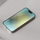 Smartphone placed on a gray desk with colorful screen display, tech mockup, digital assets, high-resolution image, clean design, sleek modern style
