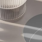 Minimalist design with glass texture shadows on a gray surface perfect for print mockups tech mockups packaging mockups and graphic designs for digital projects.
