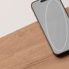 Modern smartphone screen mockup on wooden surface tech mockups clean design minimalistic display showcase digital assets for graphic designers PSD template