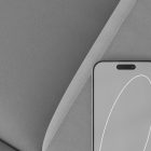 Minimalistic tech mockup showcasing a smartphone with a blank screen on a gray textured background ideal for graphic designers and digital presentations.